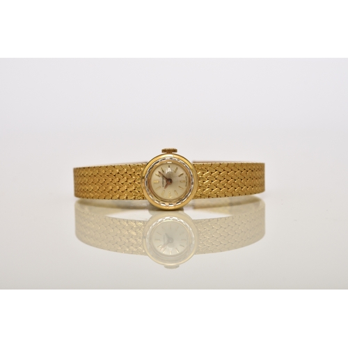 58 - Longines: A lady's 18ct gold bracelet watch Date: Circa 1968 Movement: Cal.320, 17-jewel, manual Dia... 