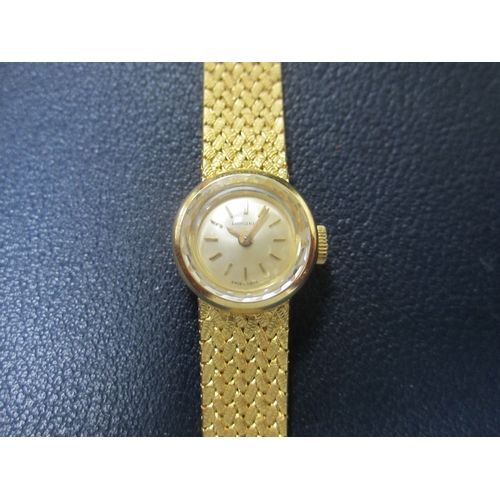 58 - Longines: A lady's 18ct gold bracelet watch Date: Circa 1968 Movement: Cal.320, 17-jewel, manual Dia... 