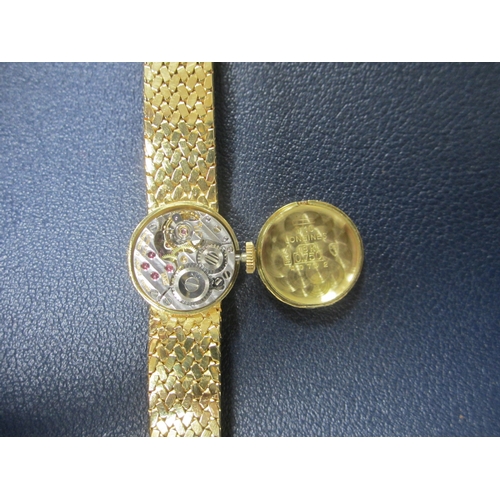 58 - Longines: A lady's 18ct gold bracelet watch Date: Circa 1968 Movement: Cal.320, 17-jewel, manual Dia... 