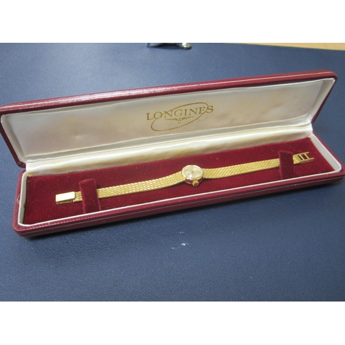 58 - Longines: A lady's 18ct gold bracelet watch Date: Circa 1968 Movement: Cal.320, 17-jewel, manual Dia... 