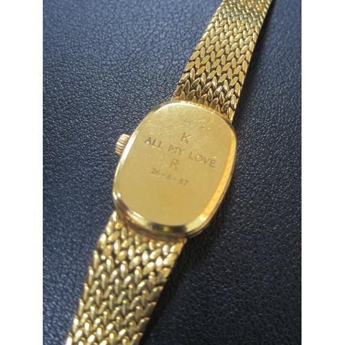 61 - Omega: A lady's 18ct gold bracelet watch Reference: 791.338 Date: Circa 1982 Movement: Omega Cal.145... 
