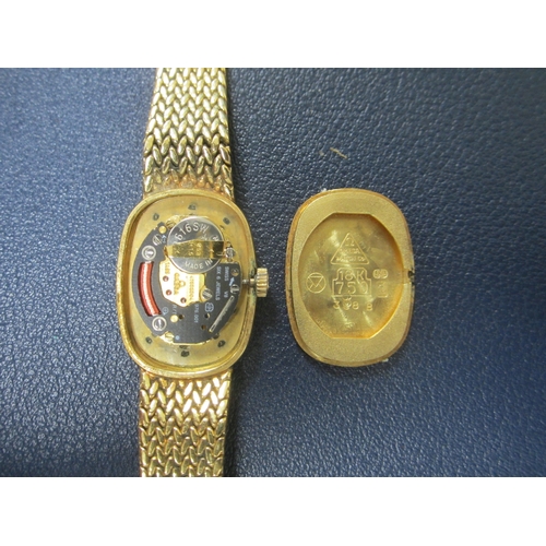 61 - Omega: A lady's 18ct gold bracelet watch Reference: 791.338 Date: Circa 1982 Movement: Omega Cal.145... 