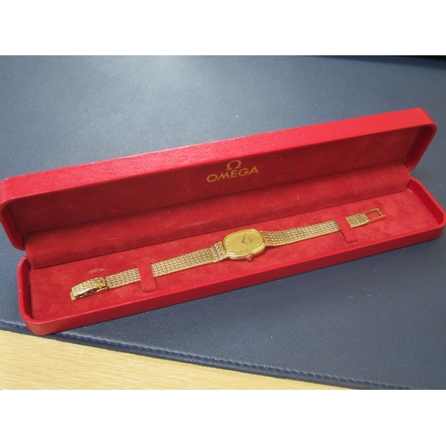 61 - Omega: A lady's 18ct gold bracelet watch Reference: 791.338 Date: Circa 1982 Movement: Omega Cal.145... 