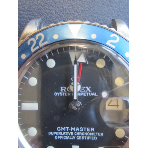 63 - Rolex: A gentleman's stainless steel automatic calendar dual-time bracelet watch
Model: GMT Master 
... 