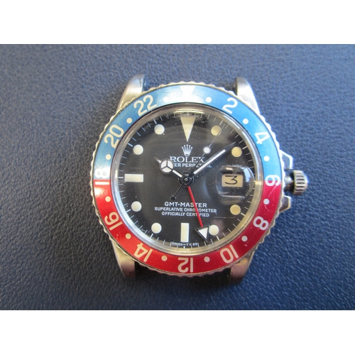 63 - Rolex: A gentleman's stainless steel automatic calendar dual-time bracelet watch
Model: GMT Master 
... 