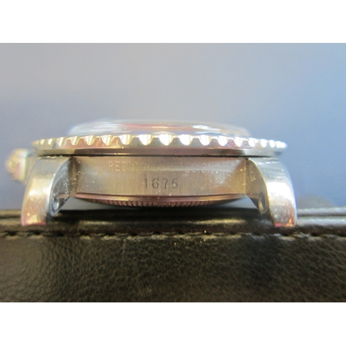 63 - Rolex: A gentleman's stainless steel automatic calendar dual-time bracelet watch
Model: GMT Master 
... 