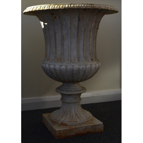 219 - A pair of cast iron garden urns, late Victorian Of campana form, painted white. 76cm high (2) Condit... 