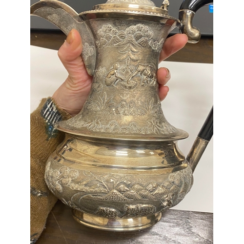 1 - A 'Sterling Silver' South East Asian four piece tea service, each piece of oval form with figural an... 