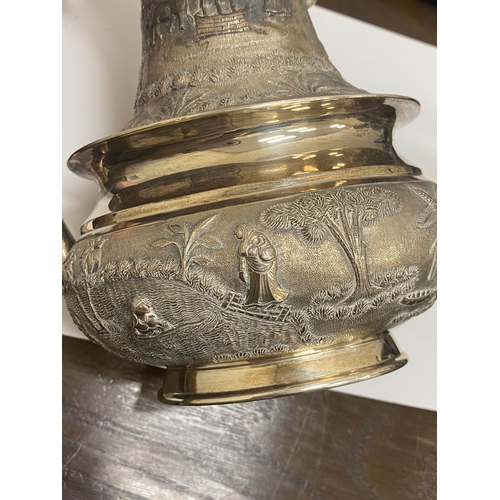 1 - A 'Sterling Silver' South East Asian four piece tea service, each piece of oval form with figural an... 