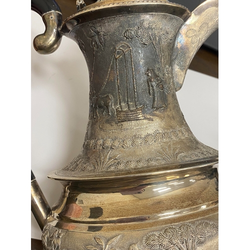 1 - A 'Sterling Silver' South East Asian four piece tea service, each piece of oval form with figural an... 