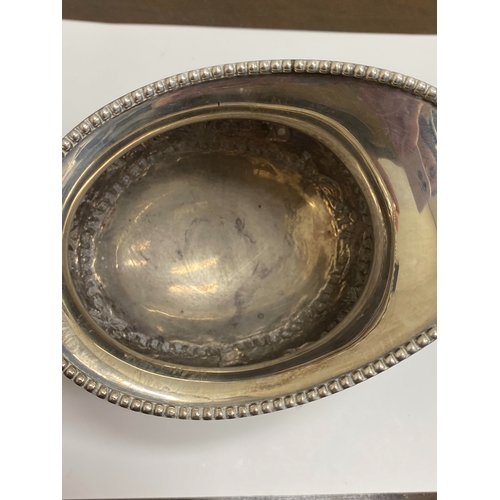 1 - A 'Sterling Silver' South East Asian four piece tea service, each piece of oval form with figural an... 