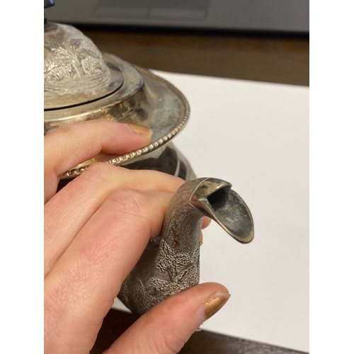 1 - A 'Sterling Silver' South East Asian four piece tea service, each piece of oval form with figural an... 