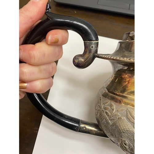 1 - A 'Sterling Silver' South East Asian four piece tea service, each piece of oval form with figural an... 