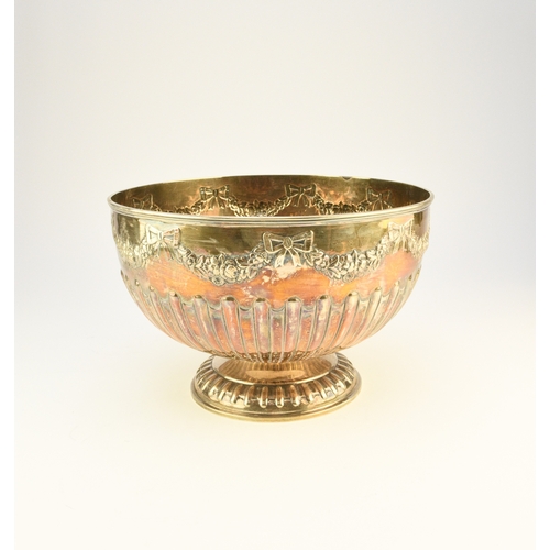 11 - An Edwardian silver punch bowl, William Hutton & Sons, London 1904, of circular half reeded form wit... 