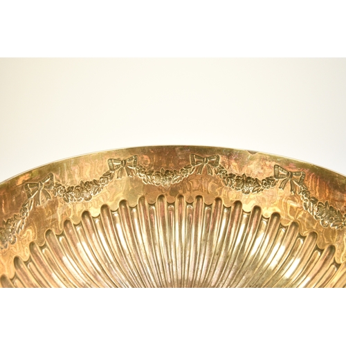 11 - An Edwardian silver punch bowl, William Hutton & Sons, London 1904, of circular half reeded form wit... 