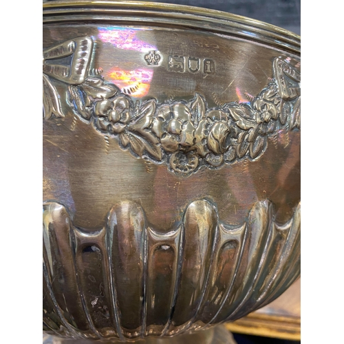 11 - An Edwardian silver punch bowl, William Hutton & Sons, London 1904, of circular half reeded form wit... 