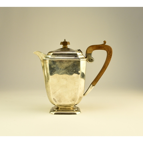 12 - A three piece silver tea service, Harrison Fisher & Co, Sheffield 1963, each piece of canted rectang... 