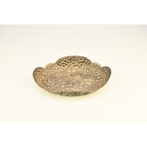 14 - A Victorian silver embossed bowl, Atkin Brothers, Sheffield 1889, of shaped oval form with repoussé ... 