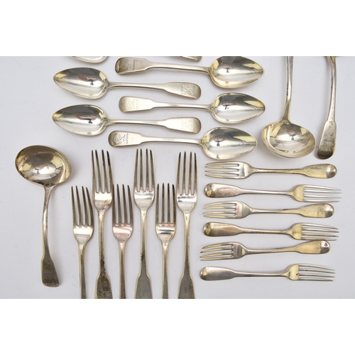 17 - A set of George III silver Fiddle pattern flatware, William Eley I & William Fearn, London 1797, com... 