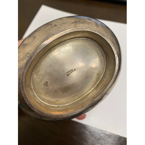 2 - A white metal hot water jug, of oval half reeded form with ebony handle and finial, 23.5cm high, rai... 