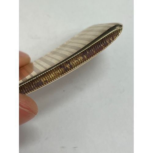 20 - A George V 9ct gold vesta case, Henry Matthews, Chester 1910, of elongated rectangular form with eng... 