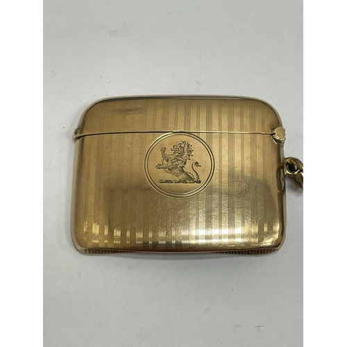 20 - A George V 9ct gold vesta case, Henry Matthews, Chester 1910, of elongated rectangular form with eng... 