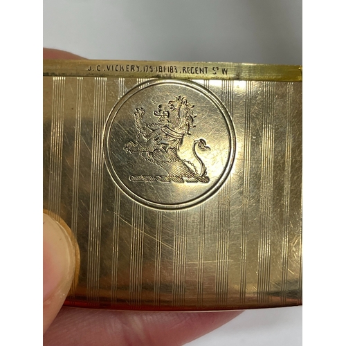 20 - A George V 9ct gold vesta case, Henry Matthews, Chester 1910, of elongated rectangular form with eng... 