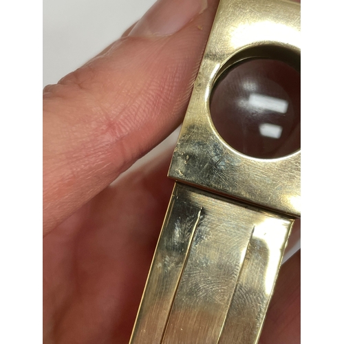 21 - A Victorian Sampson Mordan & Co 9ct gold combined bookmark / magnifier, London 1894, the book mark o... 