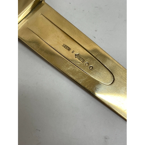 21 - A Victorian Sampson Mordan & Co 9ct gold combined bookmark / magnifier, London 1894, the book mark o... 