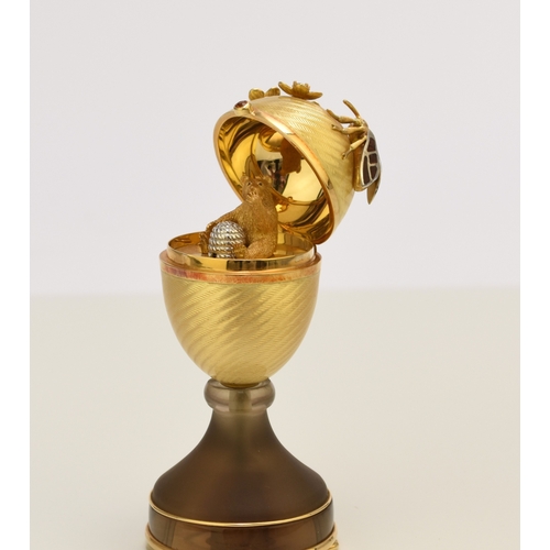 23 - Victor Mayer for Faberge; An 18ct gold, enamel, diamond, citrine and smoky quartz surprise 'Honey Eg... 