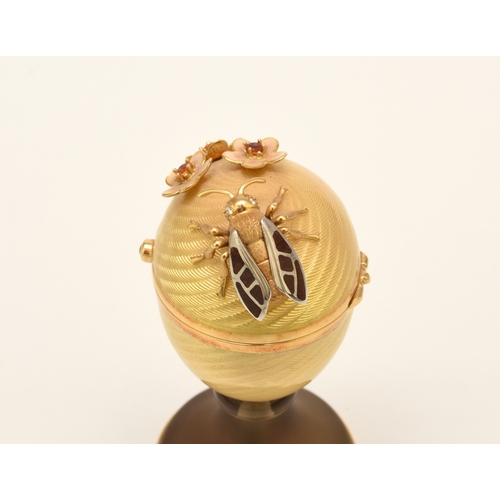 23 - Victor Mayer for Faberge; An 18ct gold, enamel, diamond, citrine and smoky quartz surprise 'Honey Eg... 