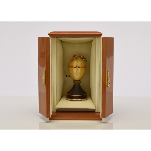 23 - Victor Mayer for Faberge; An 18ct gold, enamel, diamond, citrine and smoky quartz surprise 'Honey Eg... 