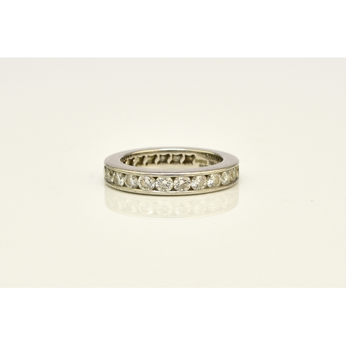 27 - A De Beers platinum diamond full eternity ring, the brilliant cut diamonds channel set in platinum, ... 