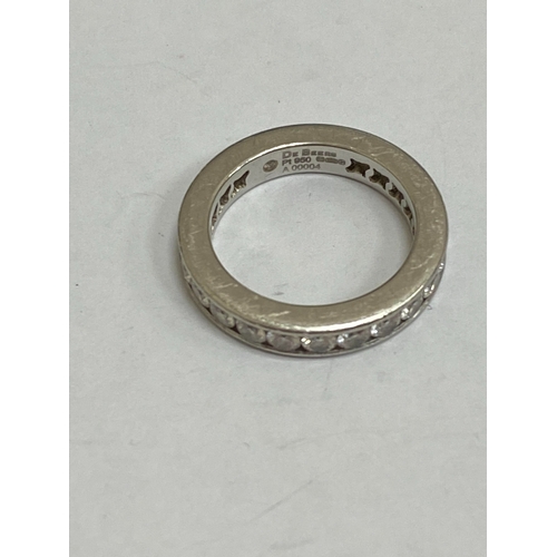 27 - A De Beers platinum diamond full eternity ring, the brilliant cut diamonds channel set in platinum, ... 