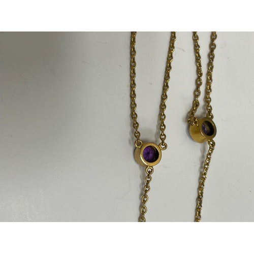 31 - An amethyst pendant necklace, designed as a heart shaped faceted amethyst within a cannetille scroll... 