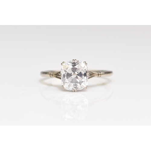 33 - An early-mid 20th century single stone diamond ring, the cushion cut diamond measures approx. 8.3mm ... 