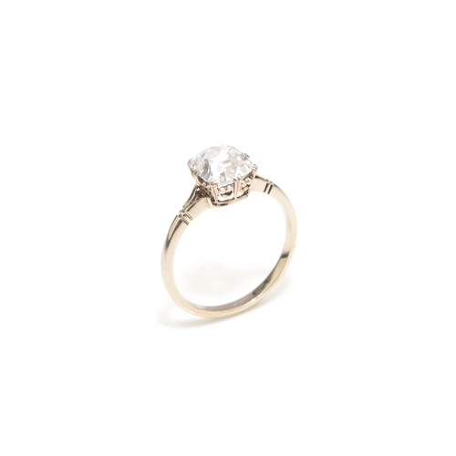 33 - An early-mid 20th century single stone diamond ring, the cushion cut diamond measures approx. 8.3mm ... 