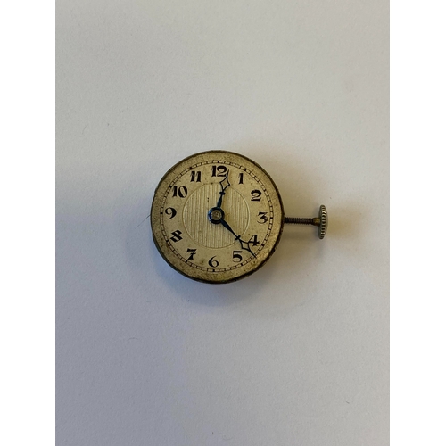 34 - An Art Deco diamond set cocktail watch, the circular silvered dial with black Roman numerals mounted... 