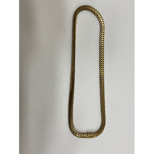 35 - A 14ct yellow gold decorative link necklace, the stylised interlocking openwork square links with in... 