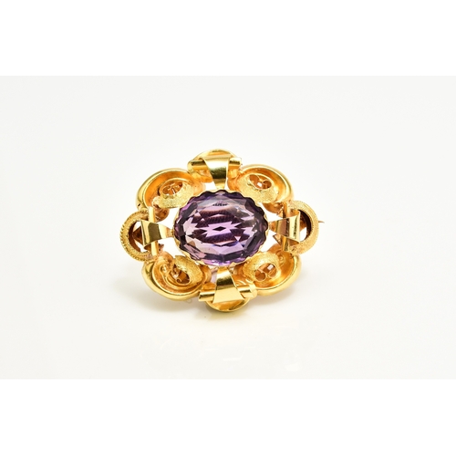 39 - A Victorian amethyst brooch, designed as a central oval mixed cut amethyst claw set within a yellow ... 