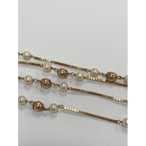 46 - A 9ct gold cultured pearl set necklace, the 9ct gold box link chain set with eleven polished gold be... 