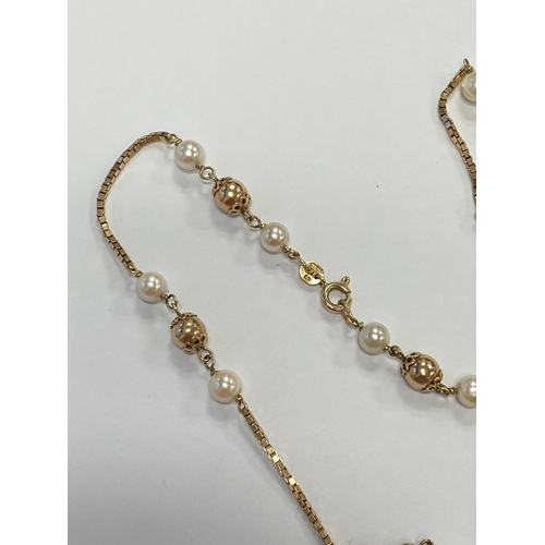 46 - A 9ct gold cultured pearl set necklace, the 9ct gold box link chain set with eleven polished gold be... 