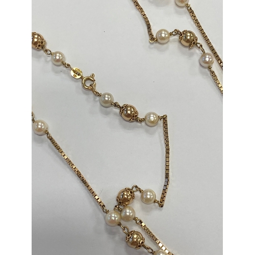 46 - A 9ct gold cultured pearl set necklace, the 9ct gold box link chain set with eleven polished gold be... 