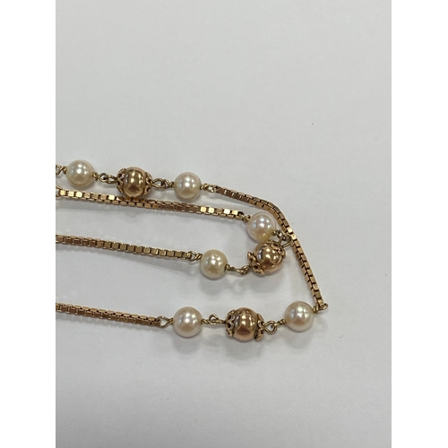46 - A 9ct gold cultured pearl set necklace, the 9ct gold box link chain set with eleven polished gold be... 