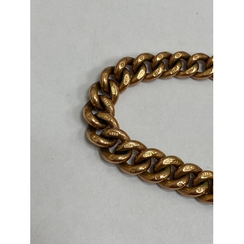 49 - A 9ct rose gold graduated curb link Albert, with attached T-bar, swivel and bolt ring, 34cm long, we... 