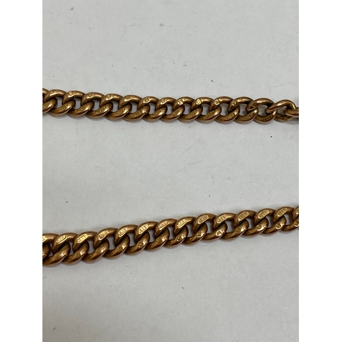 49 - A 9ct rose gold graduated curb link Albert, with attached T-bar, swivel and bolt ring, 34cm long, we... 