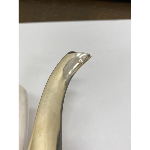 6 - A Victorian silver coffee pot, makers mark rubbed, London 1890, of pedestal half reeded form with eb... 