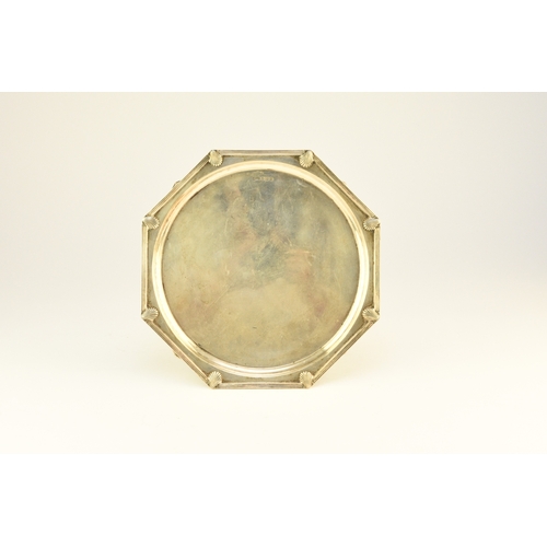 8 - An Art Deco silver salver, Walker & Hall Sheffield 1933, of octagonal form with decorative reed and ... 