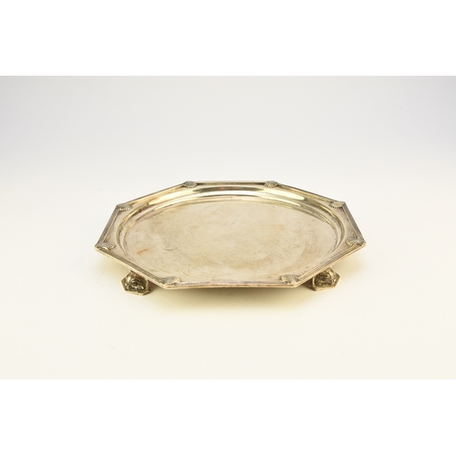 8 - An Art Deco silver salver, Walker & Hall Sheffield 1933, of octagonal form with decorative reed and ... 