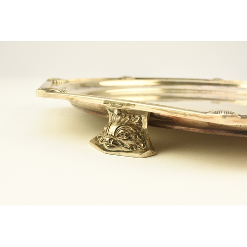 8 - An Art Deco silver salver, Walker & Hall Sheffield 1933, of octagonal form with decorative reed and ... 